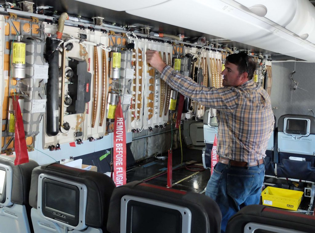 Installation and verification of avionics during post-delivery interior modifications