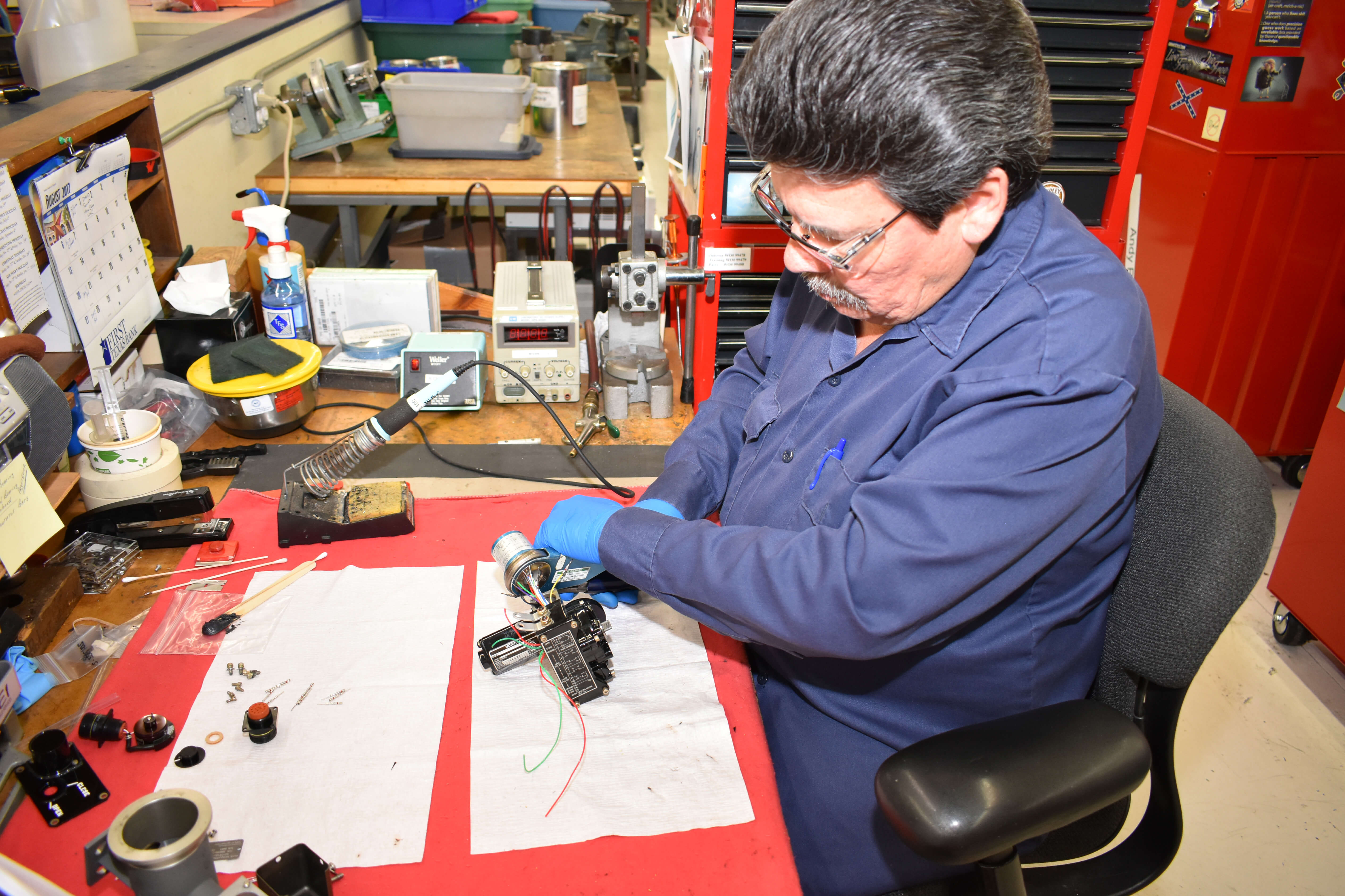 Performing a disassembly inspection a B757 Trim Air Supply Modulatinng Valve.