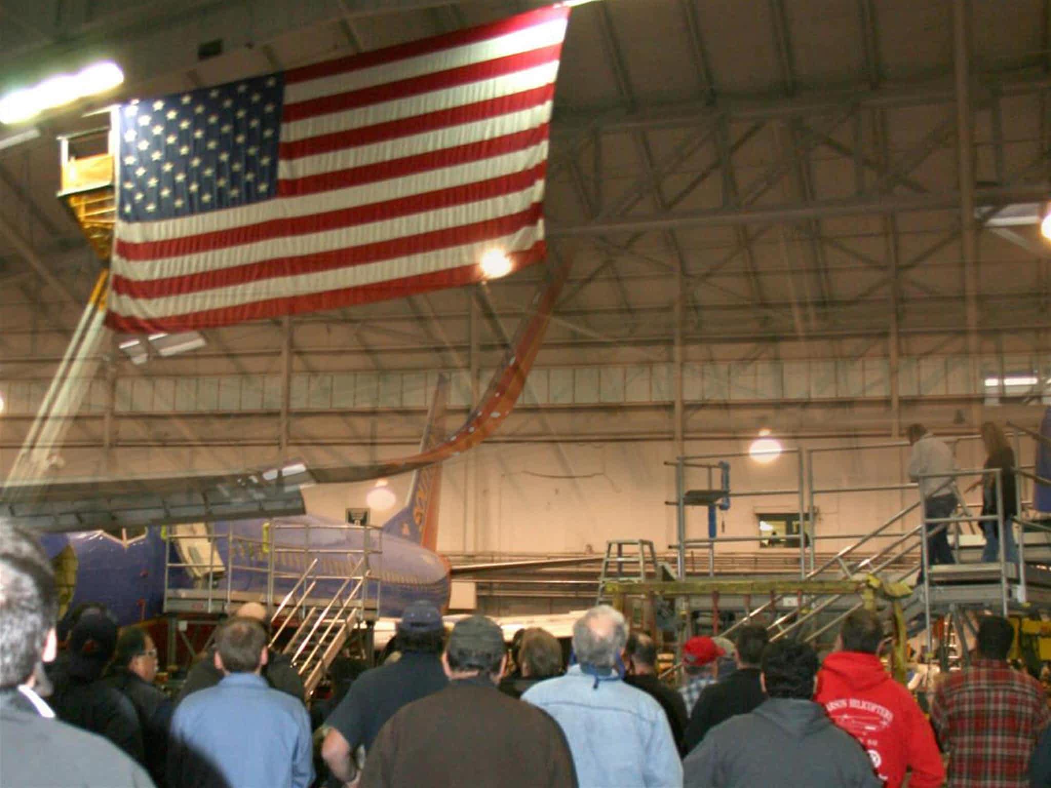 Everett flag raising in Hangar 1