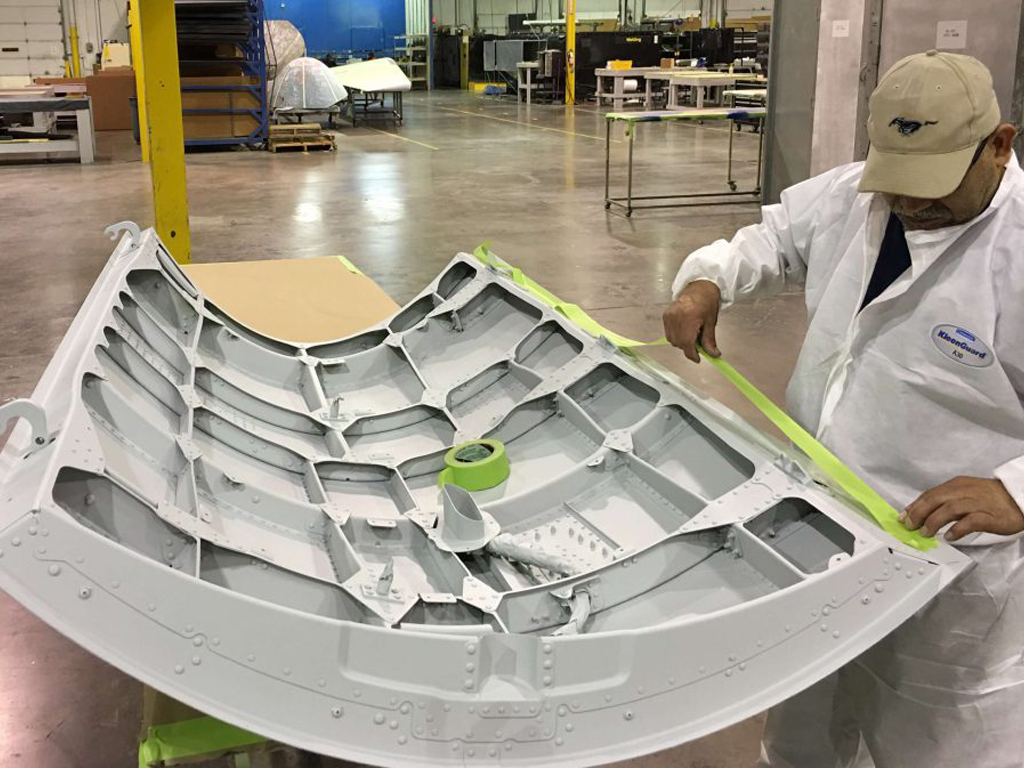 Taping interior on a B737NG APU Door  before preparing the outer surface for top coats